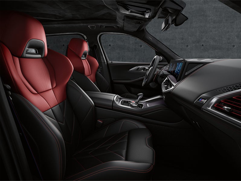 Black and Red BMW XM front seat interior | Passport BMW in Suitland MD