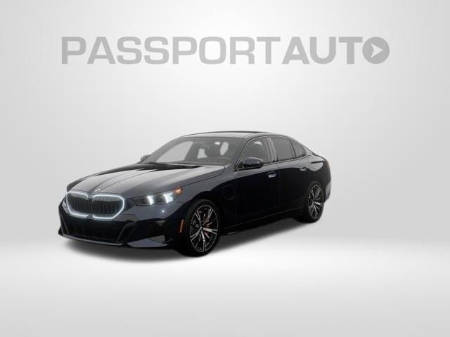 2027 BMW 5 Series 550e xDrive Sedan's photo