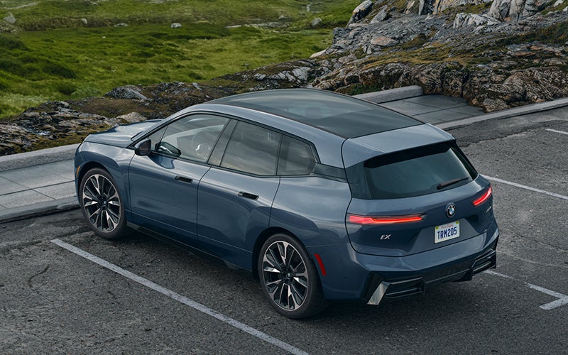 The BMW iX parked in a parking spot. | Passport BMW in Suitland MD