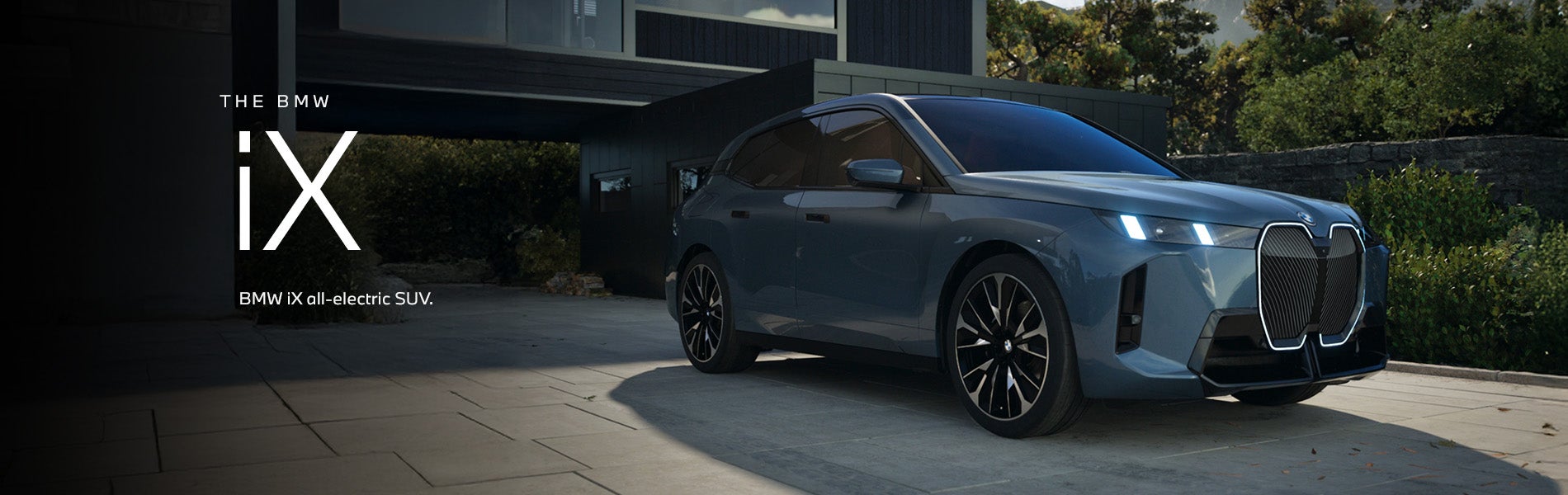 The BMW iX SUV parked. Click to learn more. | Passport BMW in Suitland MD