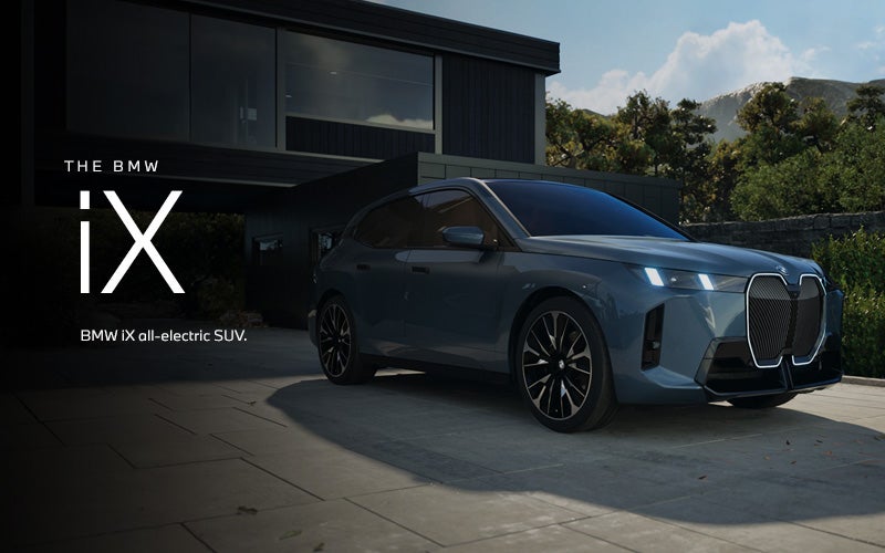 The BMW iX SUV parked. Click to learn more. | Passport BMW in Suitland MD